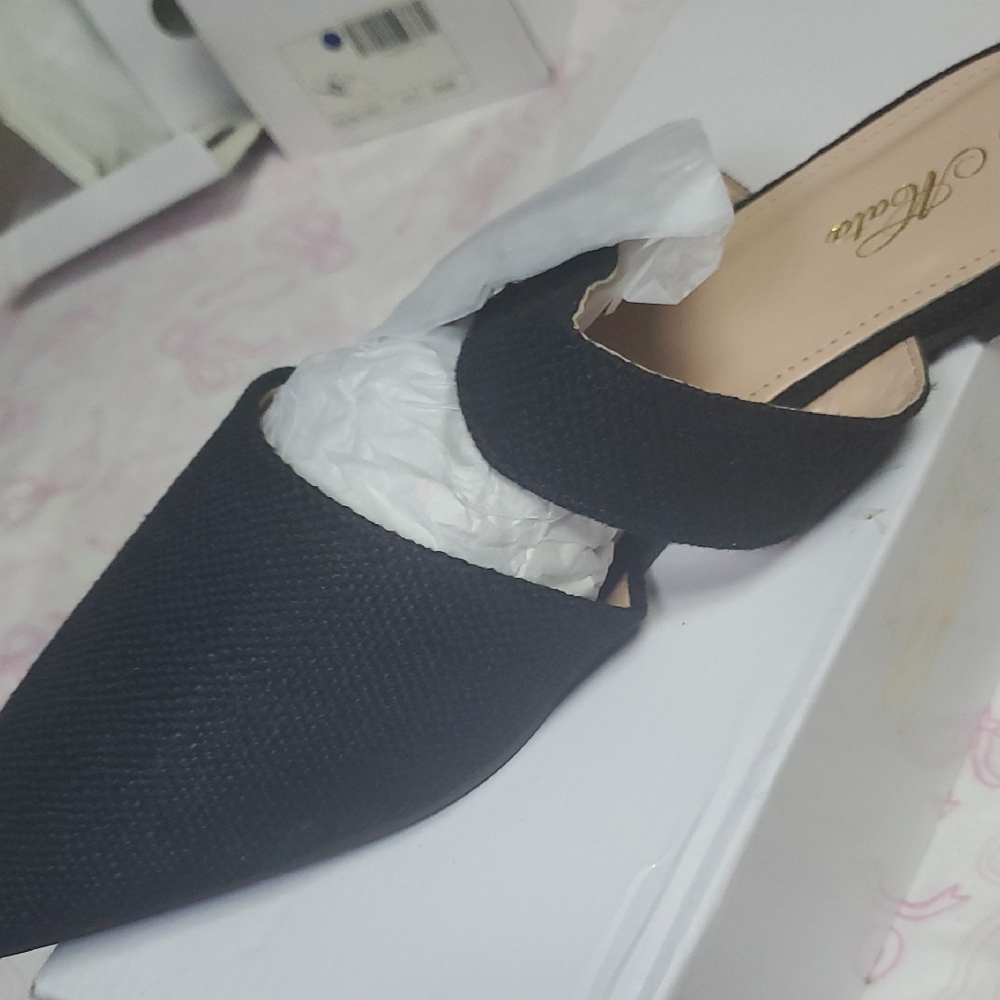 Elegant Black Women's Mules by [Brand]